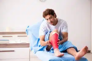 A man with a leg injury caused by someone else's negligence