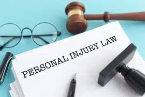 PERSONAL INJURY LAW IMAGE OF STAMP ON PAPER